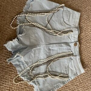 Stylish Light Blue Denim Shorts with Chain Details